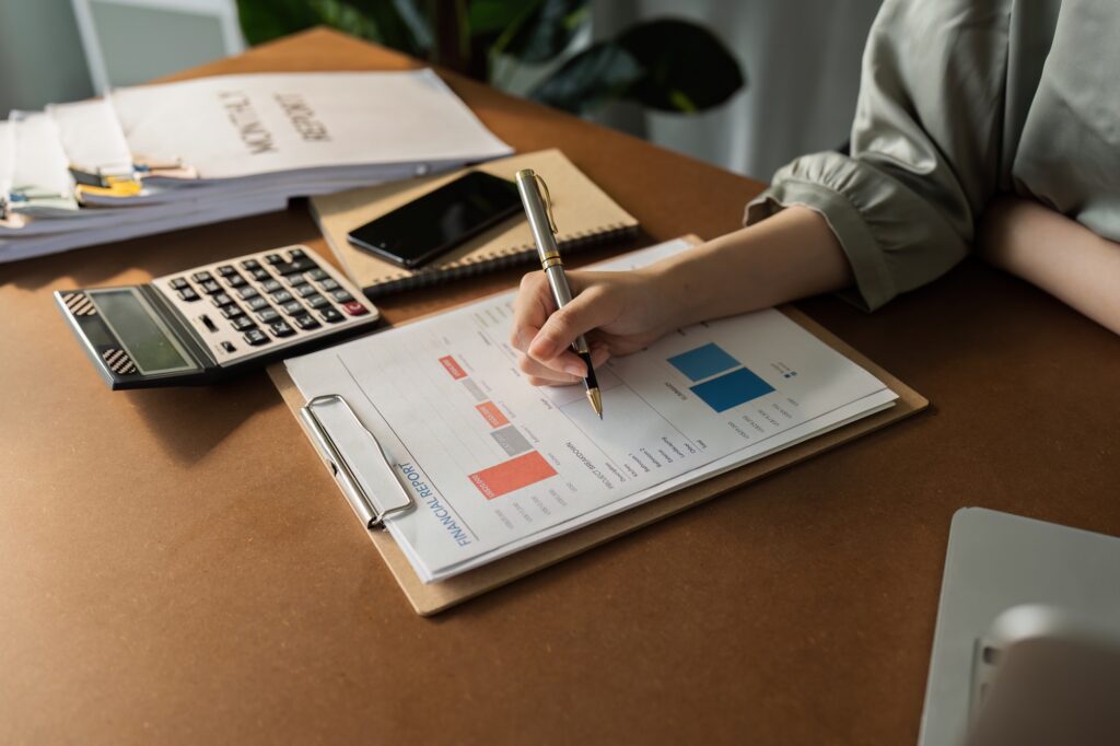 business read report figure paper chart, professional accountant calculating annual balance cash