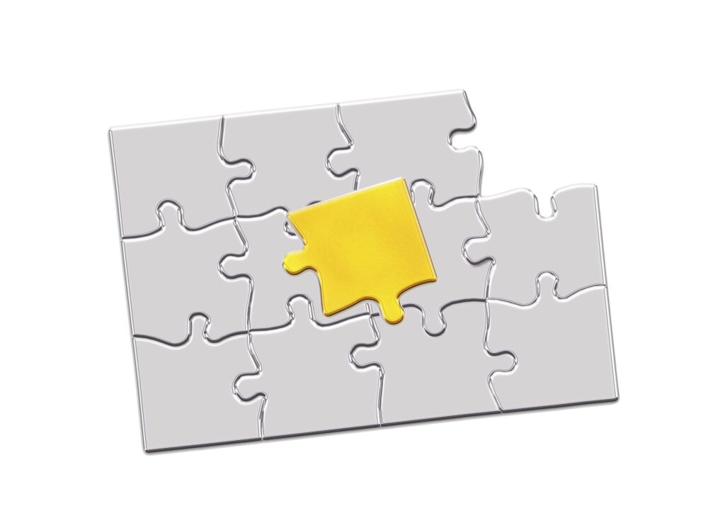 Golden jigsaw piece connected in puzzle structure