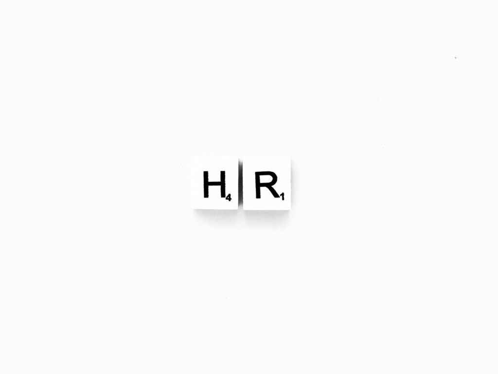 HR scrabble letters word on a white background